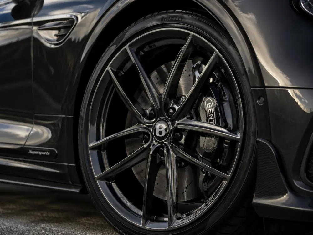 Performance wheel on a luxury car showing brake and rim detail