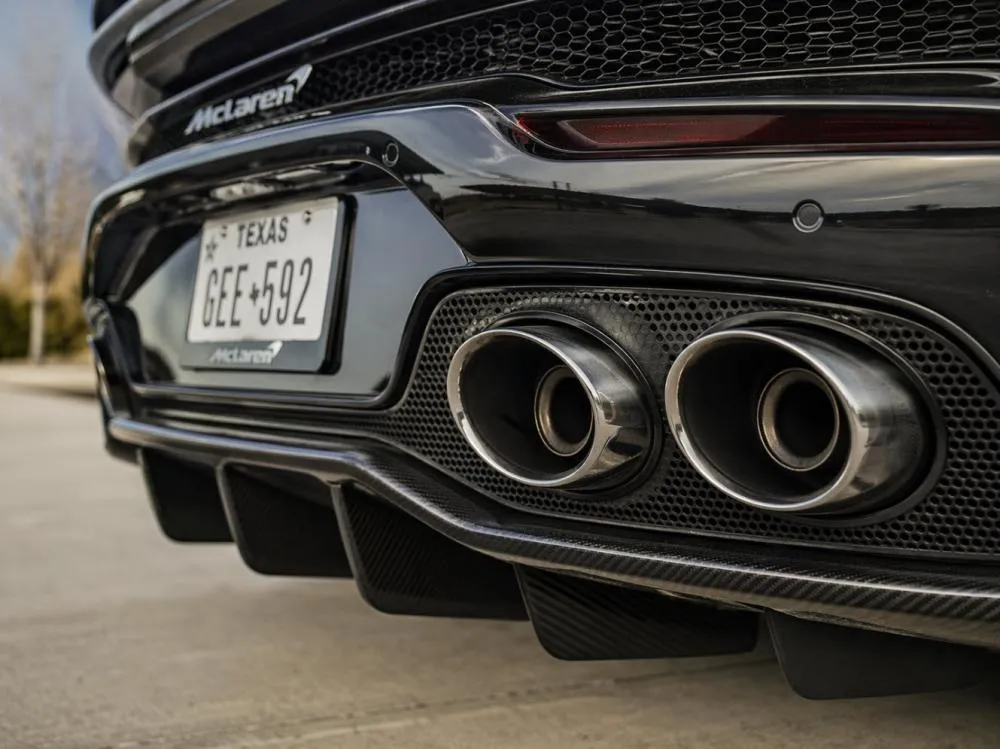 Close up of clean performance exhaust tips on a sports car